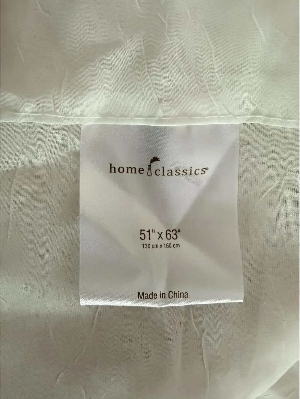 Home Classics Cream colored crushed voile curtains 51x63